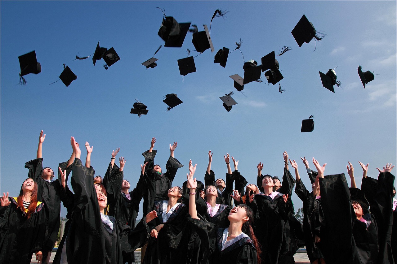 college students, graduation photo, throw hat-1872810.jpg